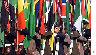 Flags of all African nations are carried by South African soldiers