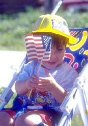 child holding American flag